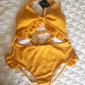 Yellow one piece cut out swimsuit